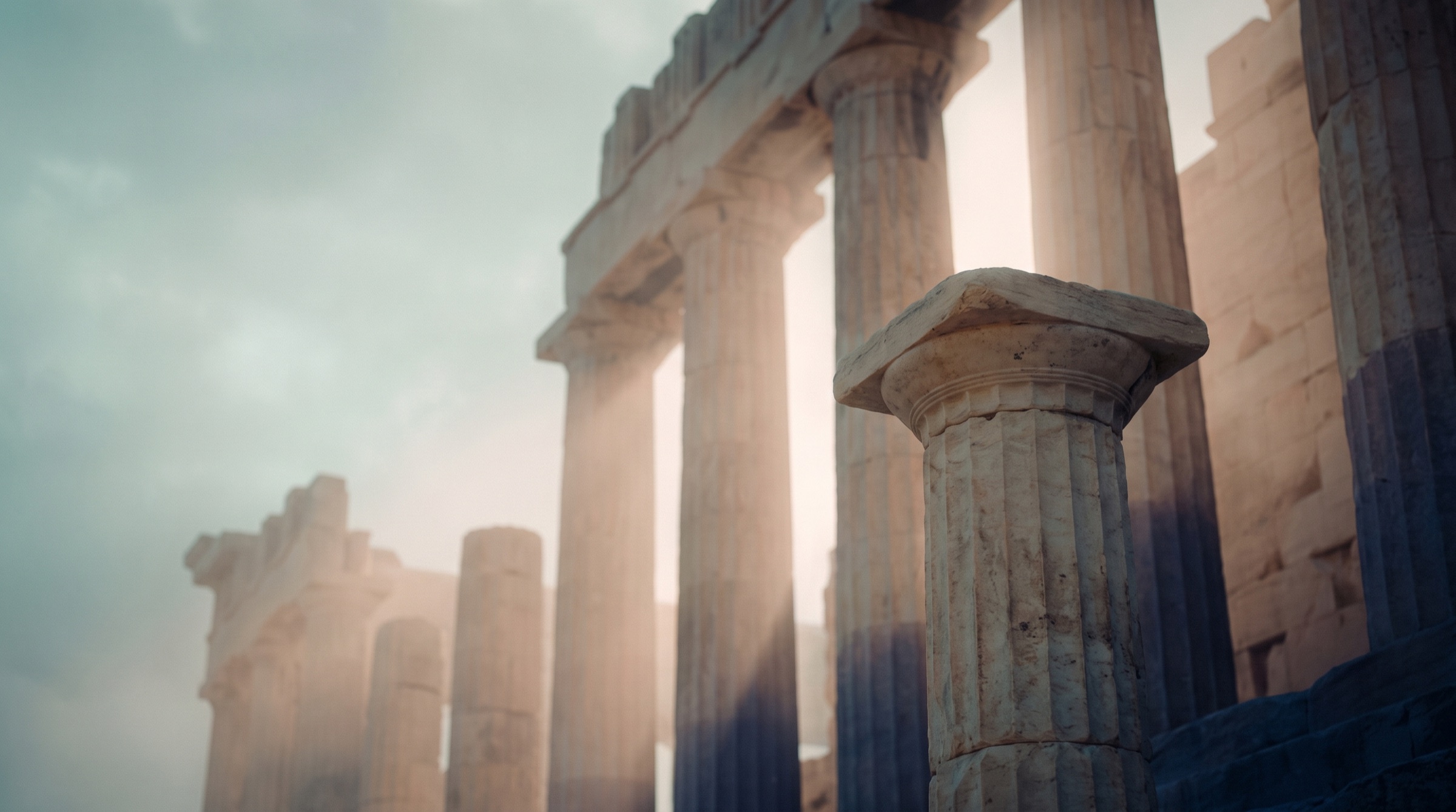 Morning light through the marble columns of an ancient Greek colonnade